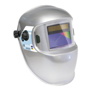 En silverfärgad SvetshjälmPromax True Color 3/5-13 DIN med UV/R-skydd DIN 15 med en justerbar vred på sidan och en tonad visningsskärm i fronten.