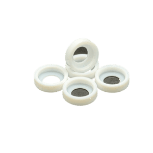 Fem stycken Värmesköld till Quartz-TIG-Kit Lilla Linde (5-pack) är arrangerade mot en vit bakgrund: fyra ligger platt, medan en står upprätt i mitten.